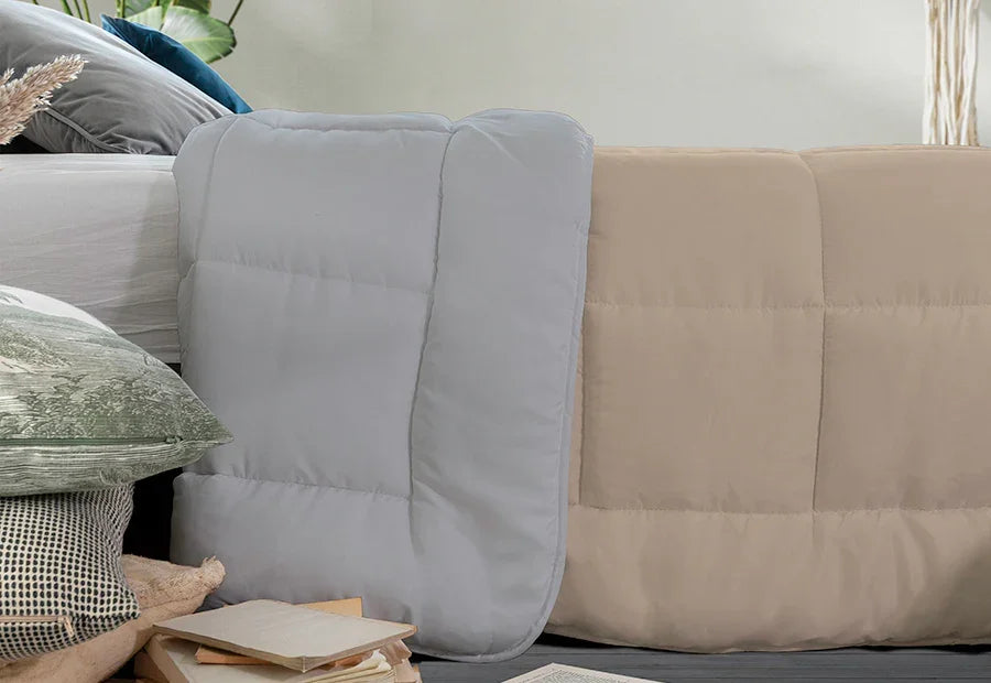 Nórdico reversible beige y gris Vivacolor sobre cama de 135/150 cm