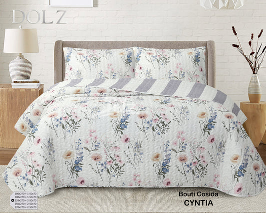 Colcha bouti reversible modelo Cyntia con estampado floral y reverso de rayas para cama de 135 y 150