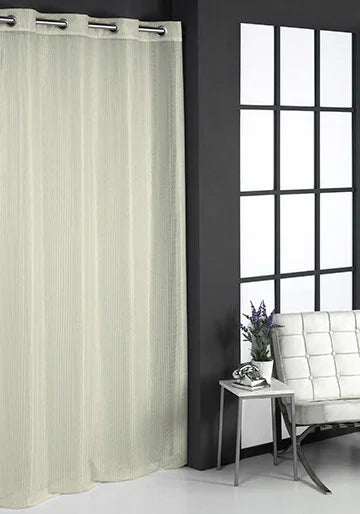 Cortina visillo beige 140x265 cm en salón luminoso