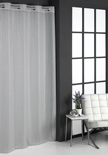 Cortina visillo gris 140x265 cm en salón moderno