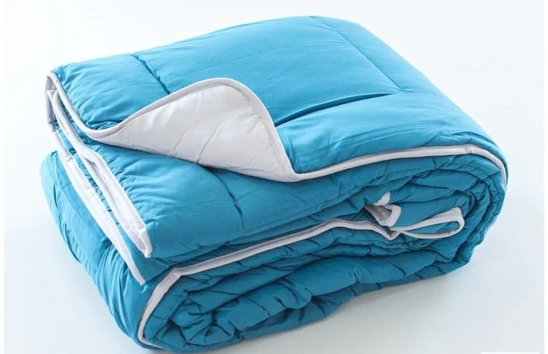 Detalle del tejido del nórdico reversible azul / gris