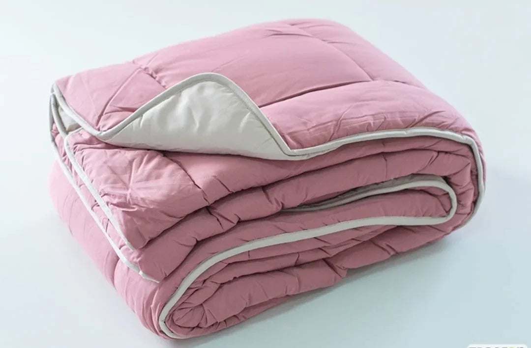 Detalle del tejido del nórdico reversible Marsala y Arena Vivacolor