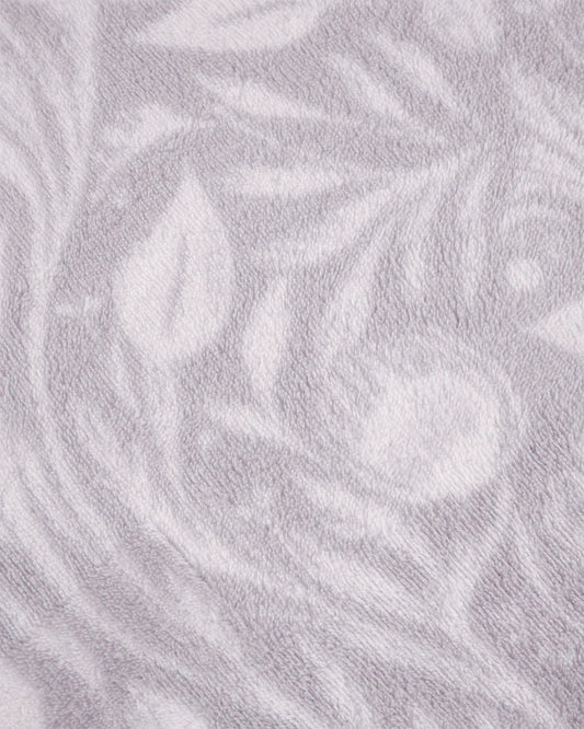 Primer plano del tejido suave de las sábanas de coralina lila de 220 gr/m2.