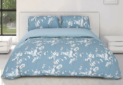 Funda nórdica reversible flores azul cama 150 cm con una cara floral y otra lisa