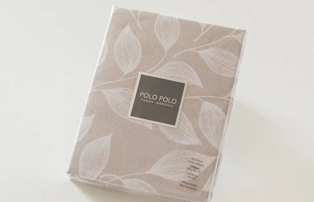 Funda nórdica Vitale doblada y empaquetada junto a la funda de almohada 45x155 cm