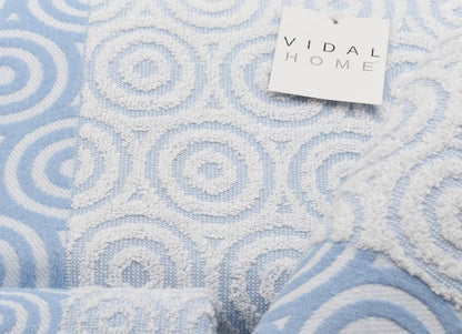 Juego de toallas en 100% algodón Spiral, en color azul de la marca Vidal Home.