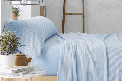 Juego de sábanas de coralina azul con tejido jacquard térmico para cama de invierno.